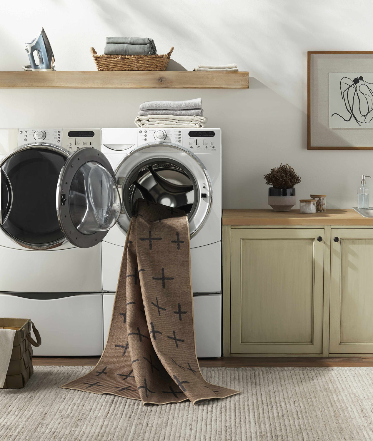 Laundry room with Haimi Black Washable Jutely Rug partially in the washing machine. Farmhouse style. Washing-Machine