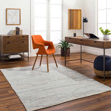 Home office with wood desk, orange chair, and light gray Ines Area Rug. Contemporary style. Roomscene-Rectangle