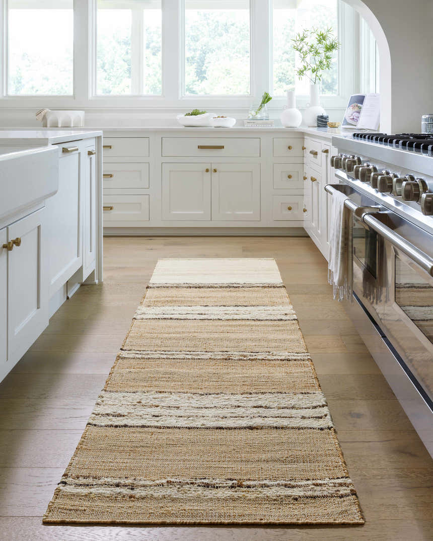 Bright kitchen scene with a tan and ivory striped Arnie Area Rug runner. Roomscene-Runner