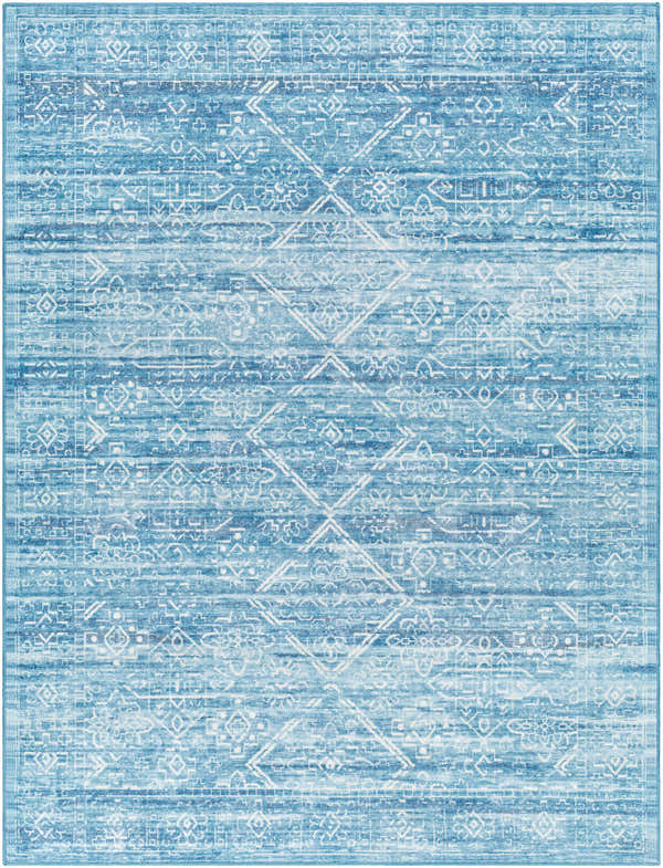 Close-up of Blake Arctic Sky Washable Area Rug. Features a farmhouse-style geometric pattern in arctic sky, denim, and white. Design-Rectangle-537