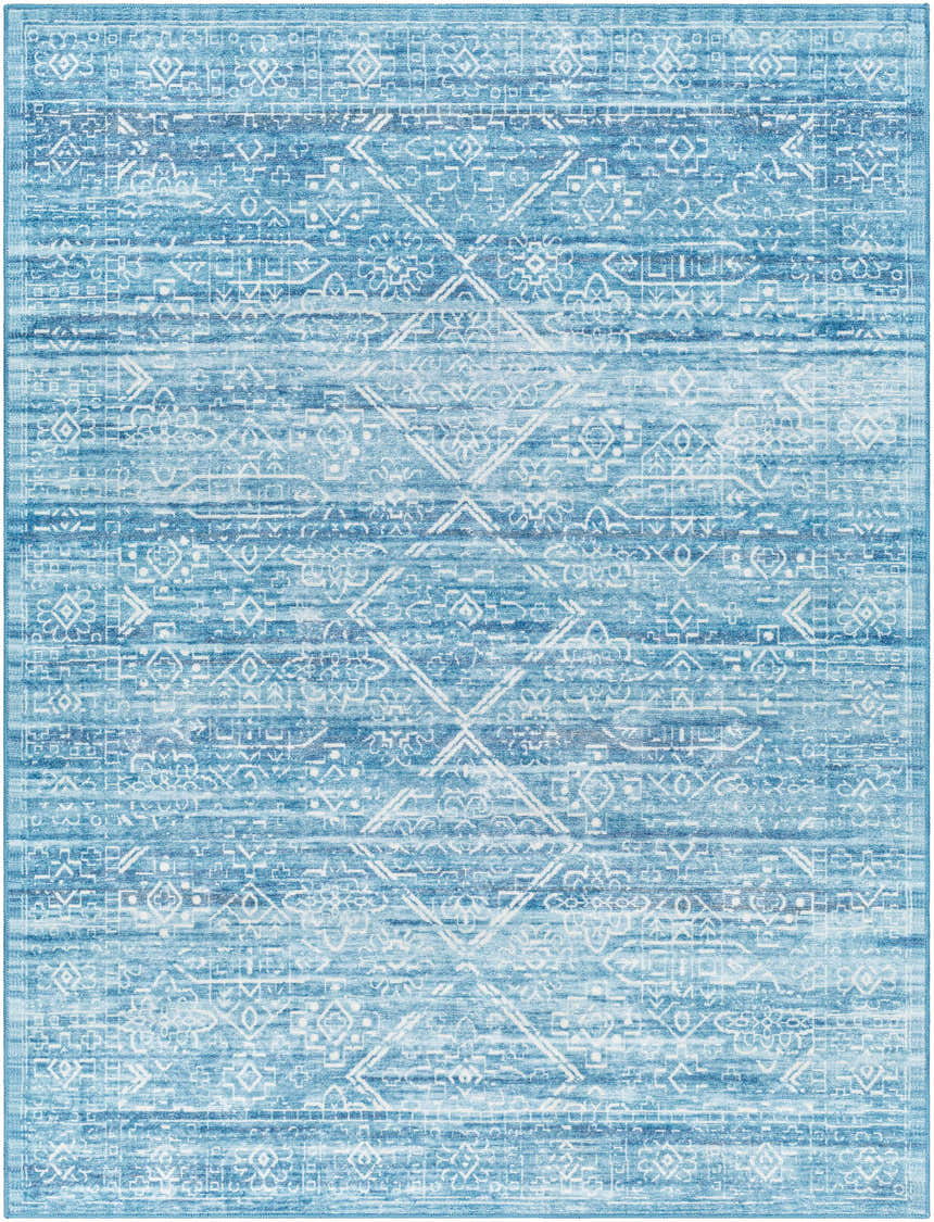 Close-up of Blake Arctic Sky Washable Area Rug. Features a farmhouse-style geometric pattern in arctic sky, denim, and white. Design-Rectangle-537