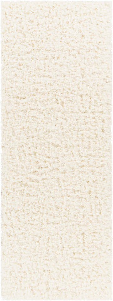 Close-up of the Siari Solid Cream Plush Rug, showing its soft, textured shag pile. Design-Runner-2773