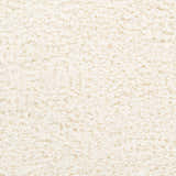 Close-up of the Siari Solid Cream Plush Rug showing its soft, textured shag pile. Swatch