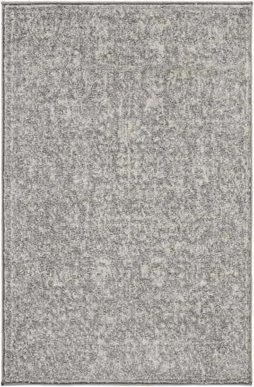 Close-up of the Sigel Area Rug. Machine-woven rug with charcoal, gray, and light beige tones. Transitional style. Design-Rectangle-23