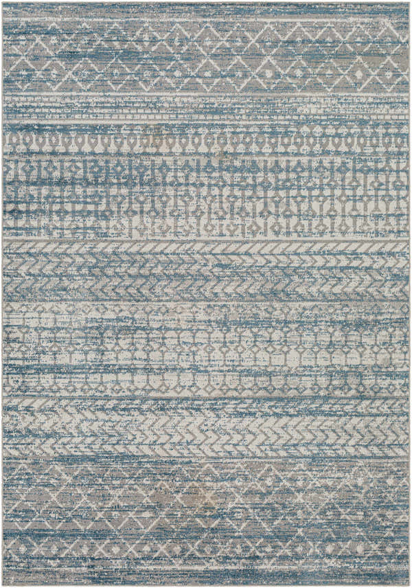 Close-up of Tambac Blue Washable Area Rug. Features farmhouse-style geometric patterns in blue, gray, and light gray. Design-Rectangle-537