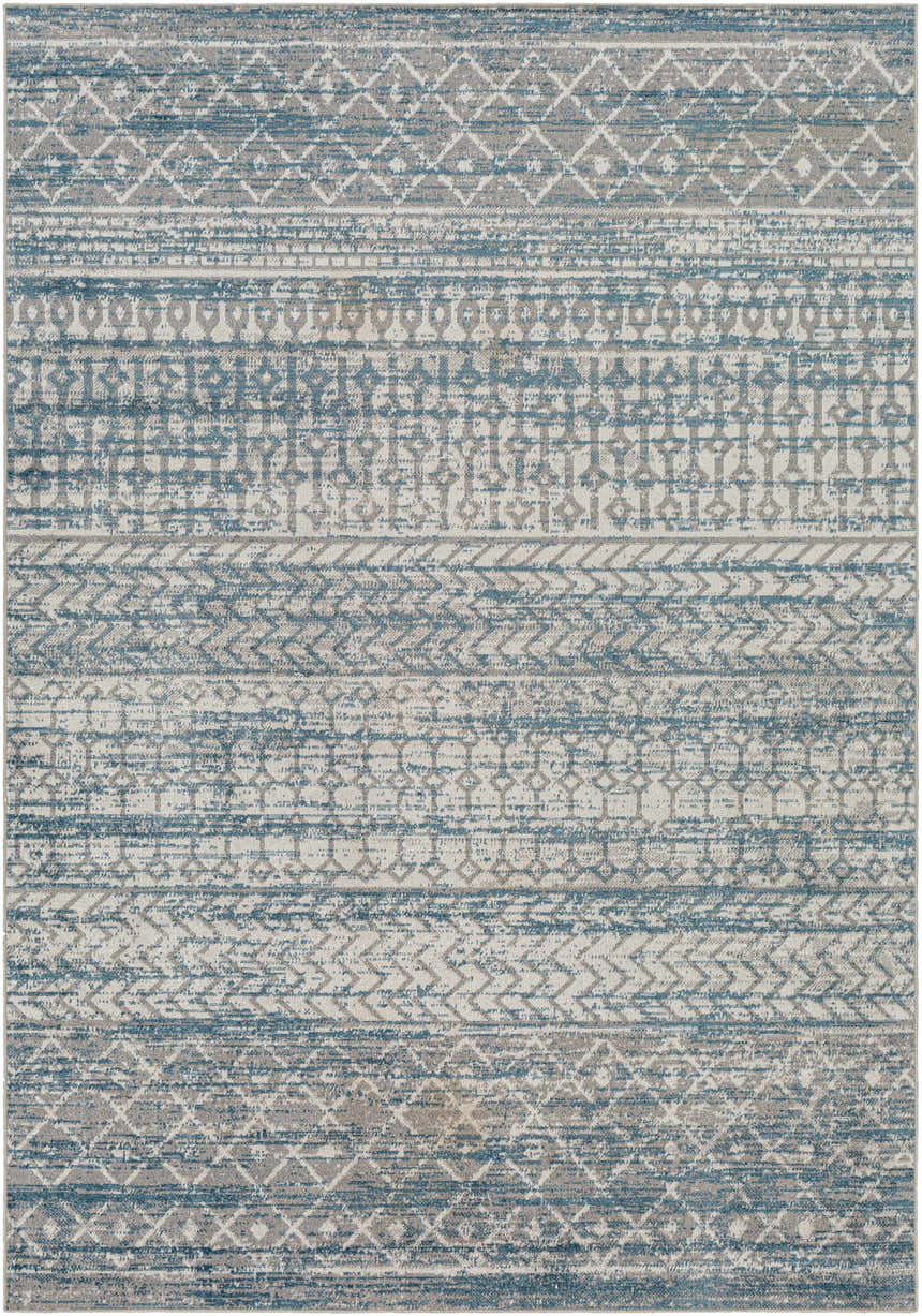 Close-up of Tambac Blue Washable Area Rug. Features farmhouse-style geometric patterns in blue, gray, and light gray. Design-Rectangle-537