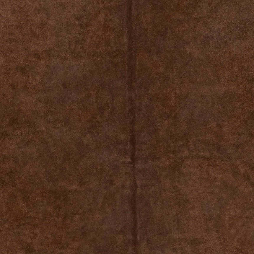 Close-up of the Sitka 5x7 Cowhide Rug. The rug has a soft, brown leather texture and a subtle Southwestern style. Swatch