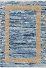 Close-up of the Ghita Recycled Blue Jean Rug. Hand-woven rug with blue denim and beige jute border. Contemporary style. Design-Rectangle-576