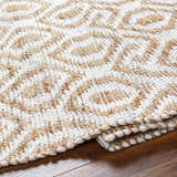 Close-up of the hand woven Isaye Beige Area Rug, featuring a geometric pattern in beige and white jute and recycled fabric. Fold