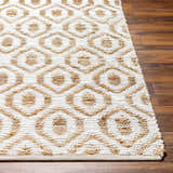 Close-up of the hand woven Isaye Beige Area Rug showing the jute and recycled fabric geometric pattern. Front