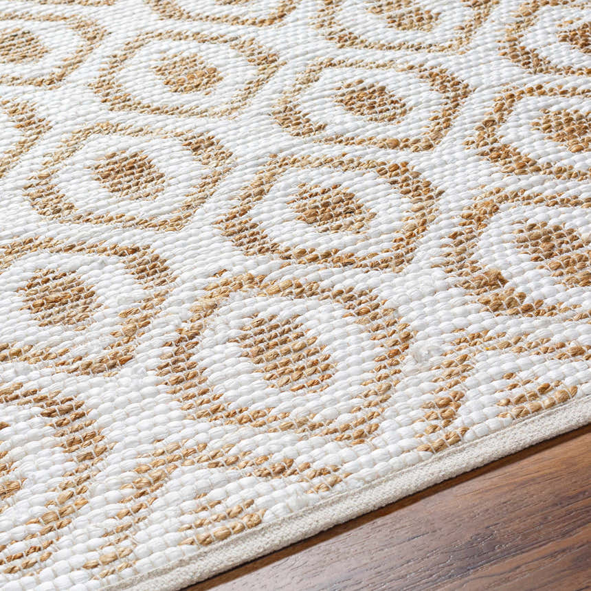 Close-up of the Isaye Beige Area Rug showing the jute and recycled fabric weave with a geometric pattern. Texture