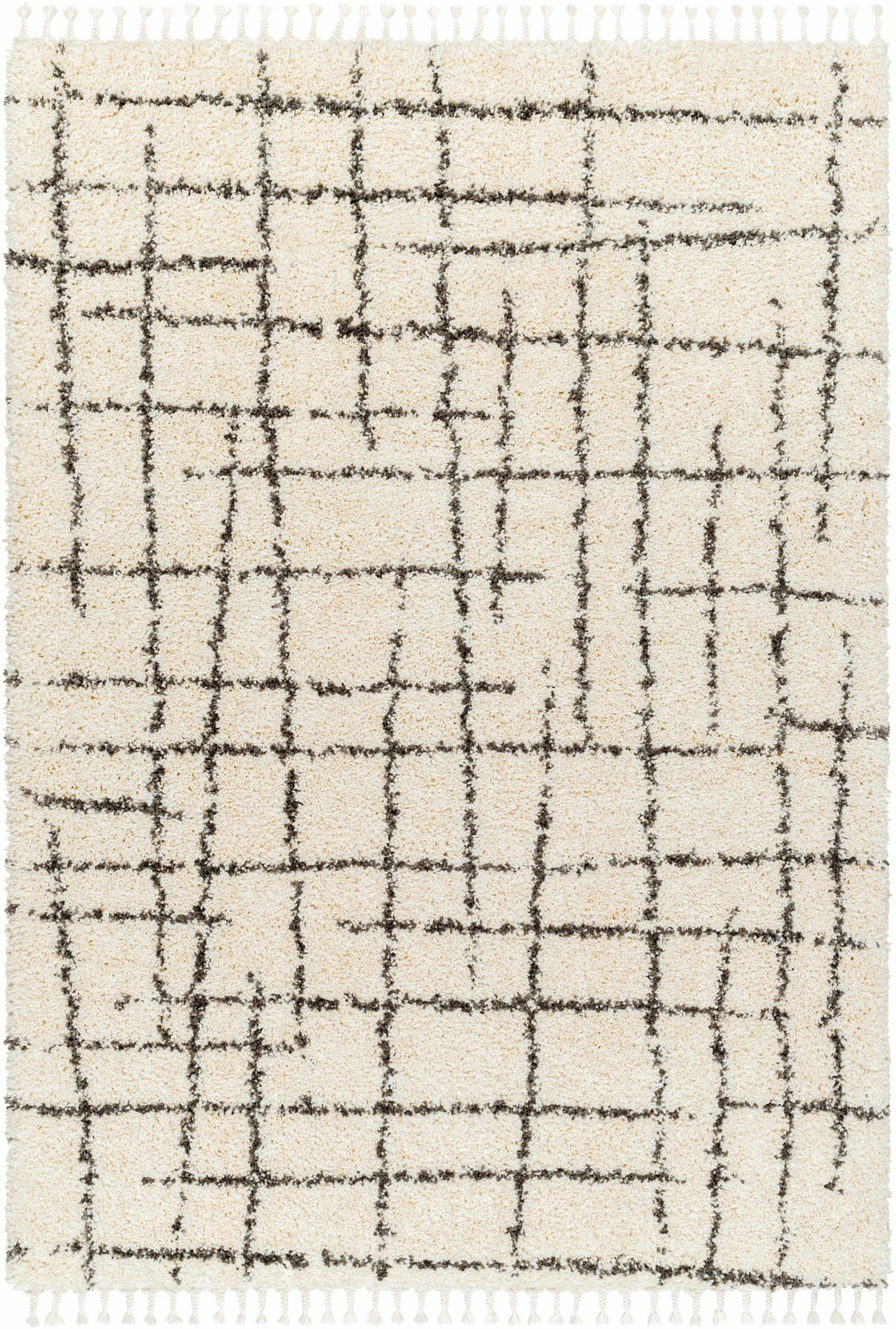 Close-up of the Hodor Area Rug: a beige shag rug with a gray grid pattern and tassel fringe. Farmhouse style. Design-Rectangle-537