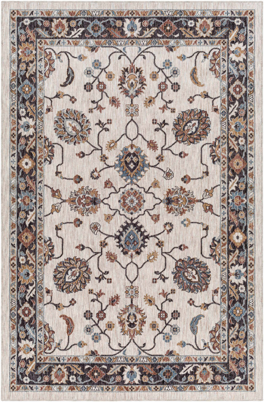 Close-up of Adjoa Area Rug. Traditional floral pattern in black, brown, blue, and cream. Farmhouse style, machine woven. Design-Rectangle-537