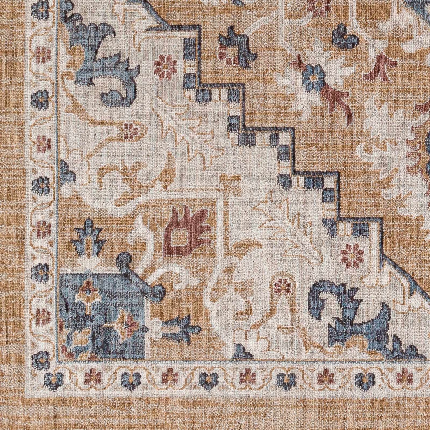Close-up of the Lewa Beige Area Rug showing its traditional pattern, clay, ivory, and denim colors, and woven texture. Swatch