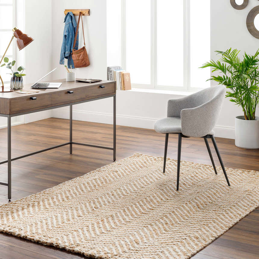 Home office with wood desk, gray chair, and natural jute Aren Area Rug featuring a geometric herringbone pattern. Roomscene-Rectangle
