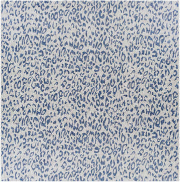 Close-up of the Skipsea Blue Leopard Performance Rug featuring a blue animal print pattern on a light gray woven texture. Design-Square-710