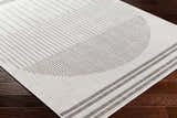 Close-up of Aviya Light Gray Area Rug showing a geometric pattern of gray lines and stripes on an off-white background. Corner