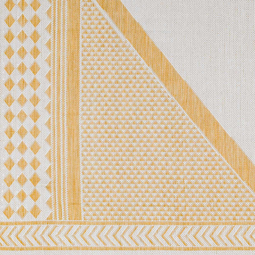 Close-up of the Efrem Mustard Area Carpet, featuring a geometric design with diamond, stripe, and chevron patterns in mustard and off-white. Swatch