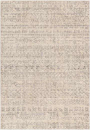 Close-up of the Truc Area Rug, a machine-woven rug with a bone base and cloud gray, bohemian-inspired geometric patterns. Design-Rectangle-537