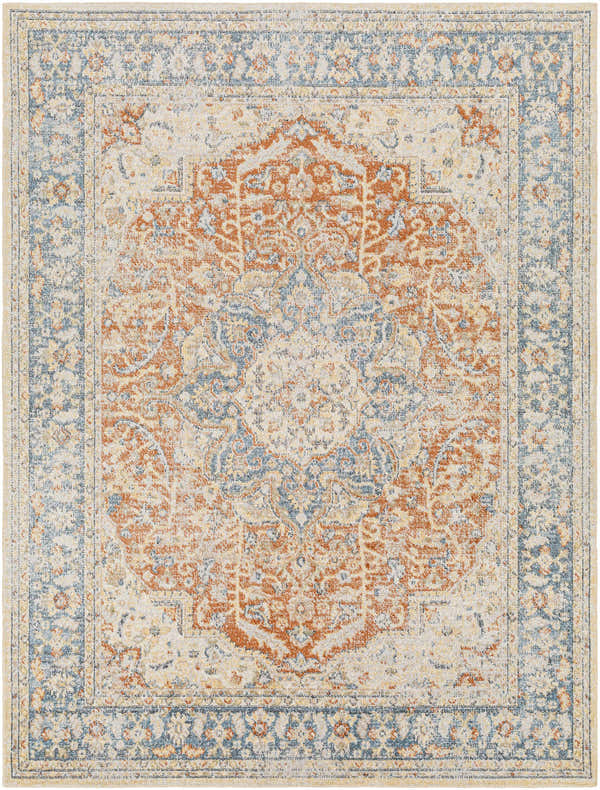 Close-up of Emke Rust Washable Area Rug. Features traditional design in rust, beige, gray, and blue tones. Machine woven texture. Design-Rectangle-537
