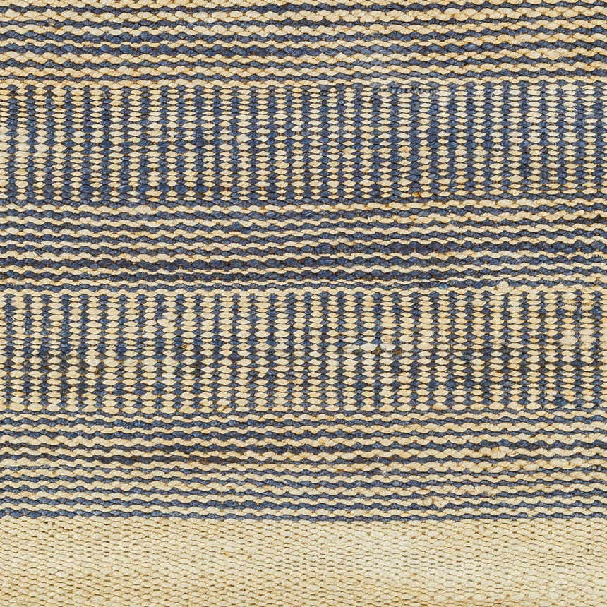 Close-up of the hand woven Blue Elle Area Rug, featuring a geometric pattern in denim and natural jute. Swatch