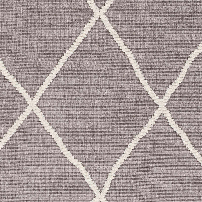Close-up of Amani Gray Washable Rug, featuring a geometric diamond pattern in white thatch on a dark gray background. Swatch