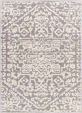 Close-up of the Beren Gray Washable Area Rug, featuring a traditional bone and gray pattern and machine woven texture. Design-Rectangle-57