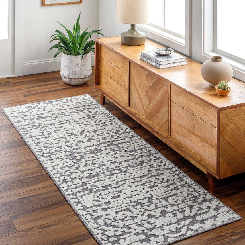 Entryway with Beren Gray Washable Area Rug runner, wood console table, plants, and hardwood floors. Farmhouse style. Roomscene-Runner