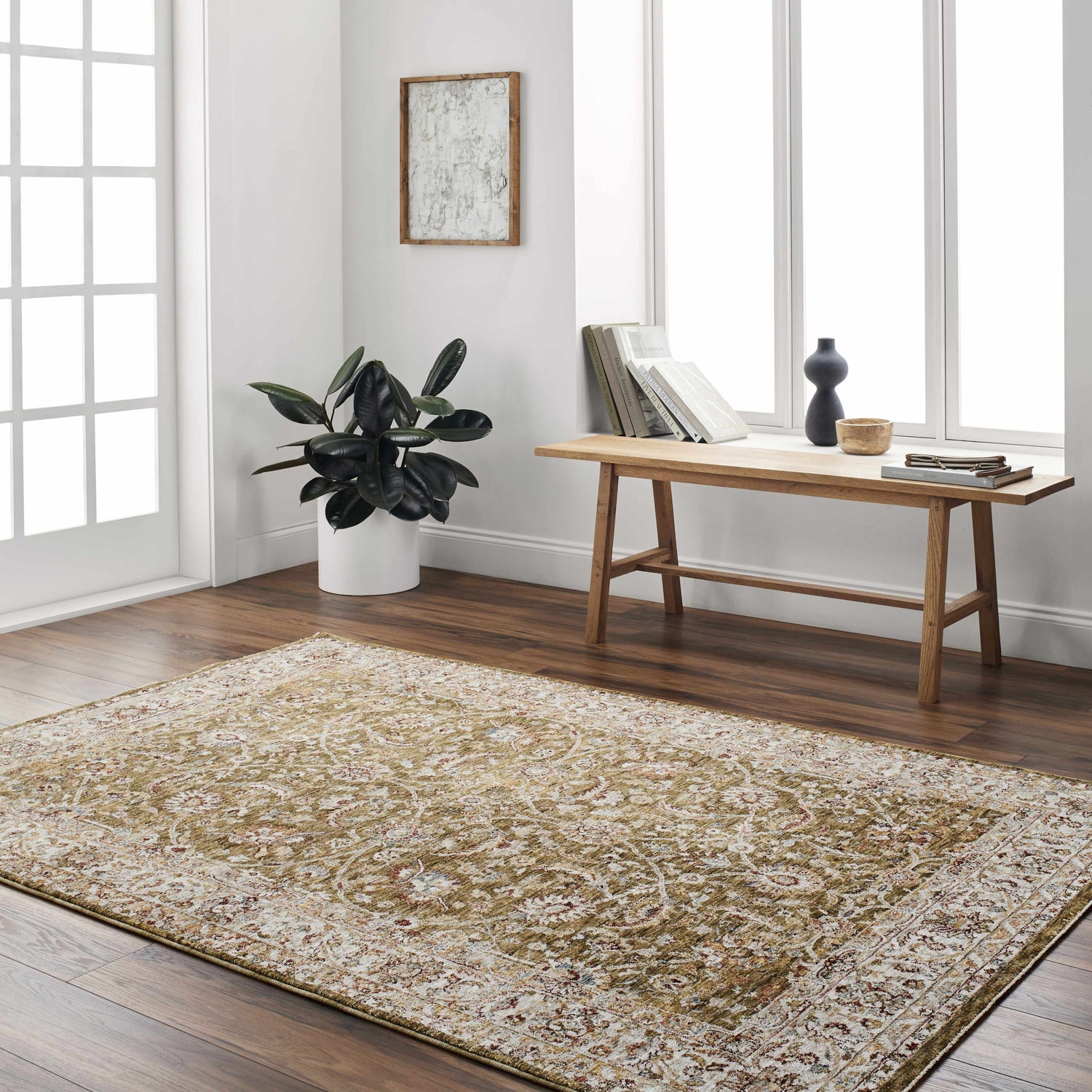 Bright entryway with Dyan Green Textured Rug, wood floors, bench with books, and potted plant. Farmhouse style. Roomscene-Rectangle