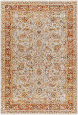 Close-up of the Dyan Cream Textured Rug with Fringes. Features a traditional floral pattern in brick red, mustard, and blue. Design-Rectangle-575