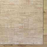 Close up of Dekan Tan Area Rug showing lambswool and light brown colors and subtle traditional pattern. Corner