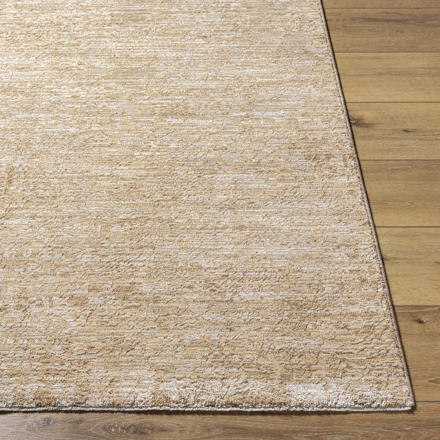 Close-up of the Katia Tan Area Rug showing its subtle khaki and tan pattern and soft, textured polyester material. Front