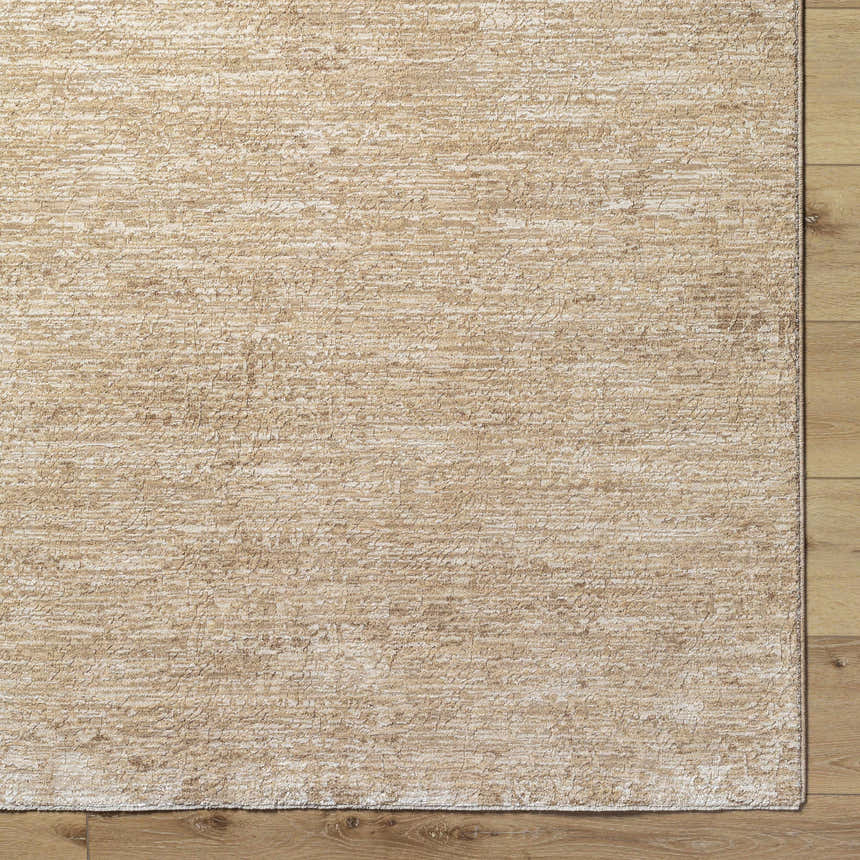 Close-up of the Katia Tan Area Rug showing its khaki and tan colors and subtle farmhouse pattern. Corner