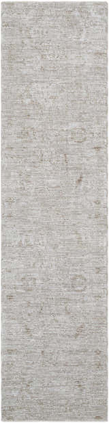Close-up of the Katia Area Rug, light gray and natural gray, with a subtle traditional pattern and soft texture. Design-Runner-2710