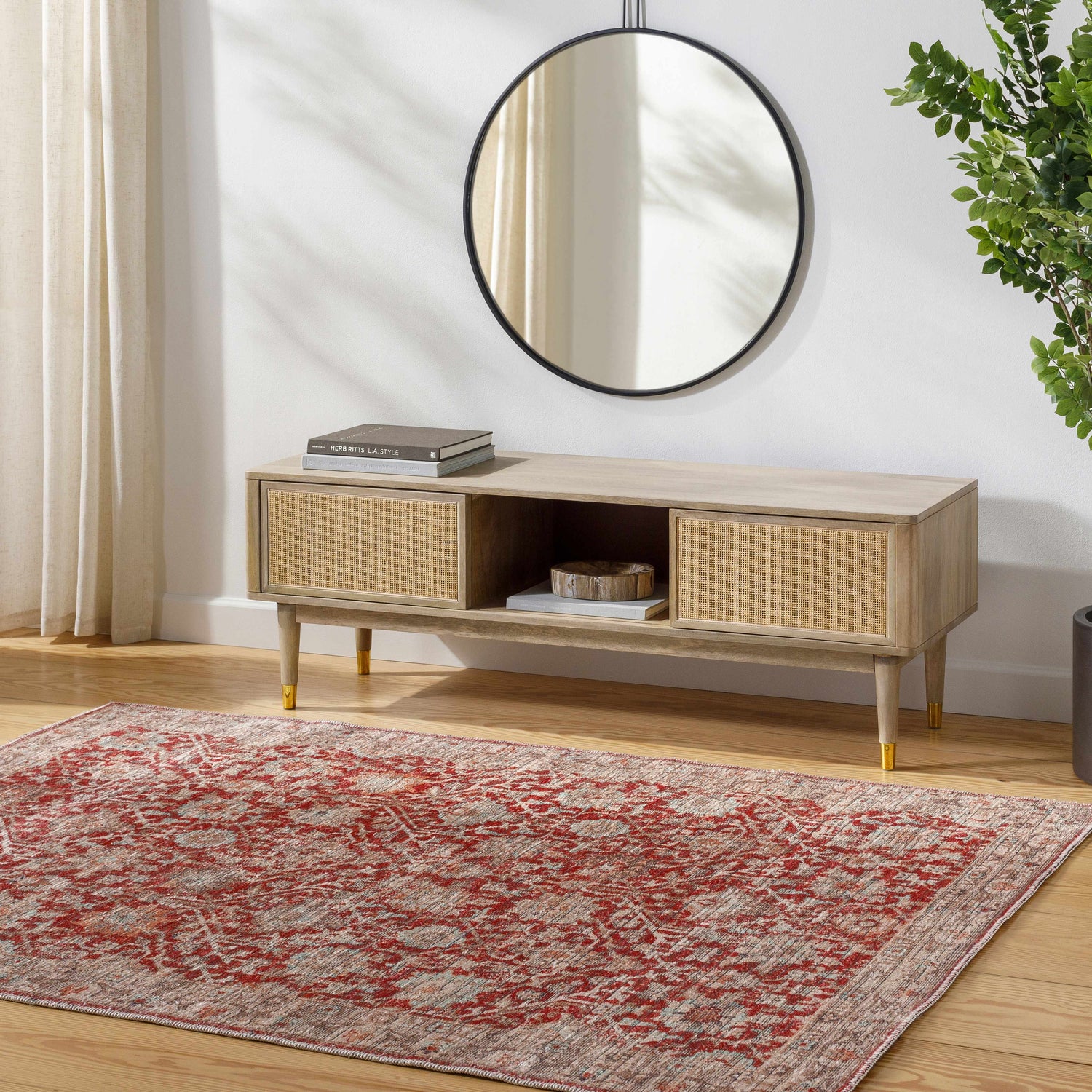 Entryway scene with a red Cathy Area Rug, light wood console table, round mirror, and plant. Roomscene-Rectangle