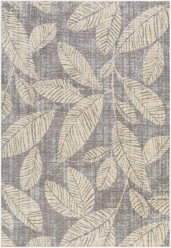 Close-up of the Snook Area Rug, showcasing its beige leaf pattern on a gray textured background. Coastal style rug. Design-Rectangle-5373