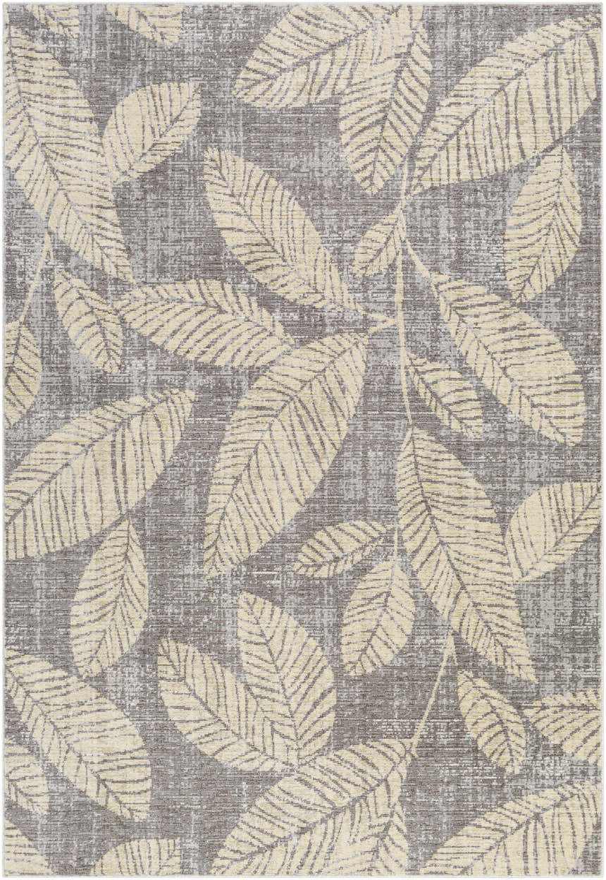 Close-up of the Snook Area Rug, showcasing its beige leaf pattern on a gray textured background. Coastal style rug. Design-Rectangle-5373