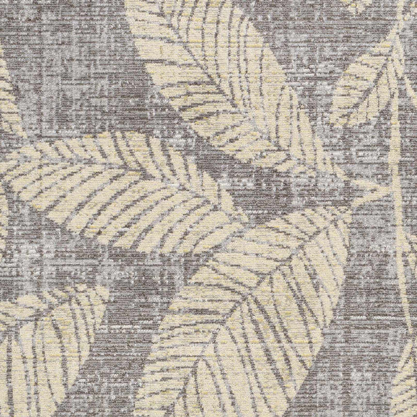 Close-up of Snook Area Rug: beige leaf pattern on a charcoal and gray textured background. Coastal style. Swatch