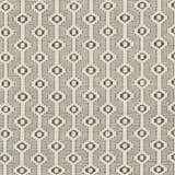 Close-up of the Puna Area Rug showing its black and bone geometric pattern and hand-woven texture. Swatch