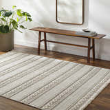Entryway with beige Dagan Area Rug, wood bench, mirror, and monstera plant. Farmhouse style. Roomscene-Rectangle