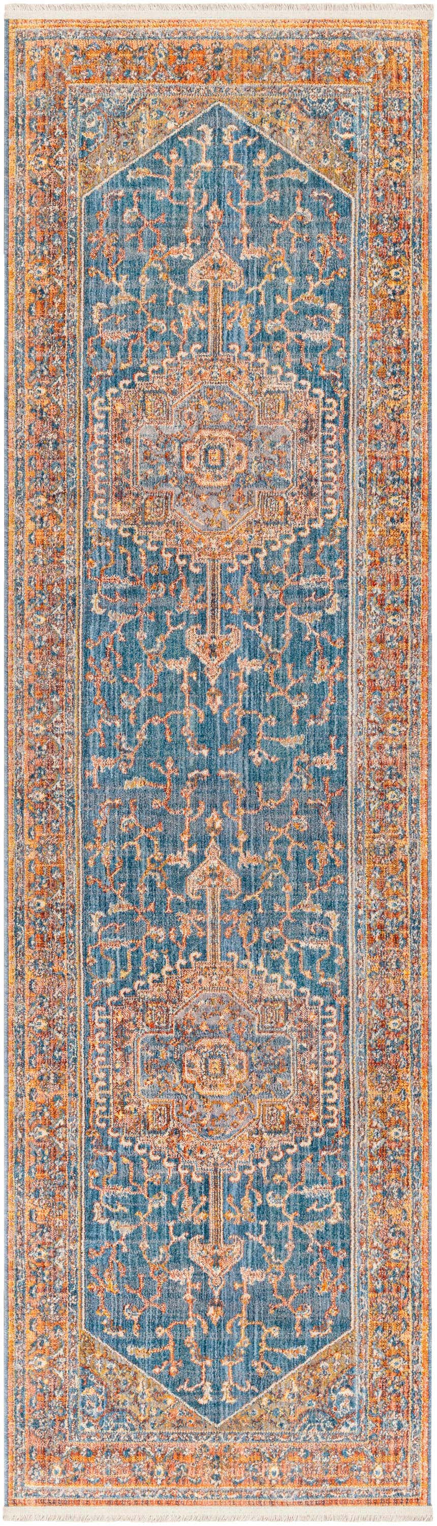 Close up of the Solana Blue Medallion Area Carpet, showcasing its brick red, burnt orange, and blue bohemian design. Design-Runner-279