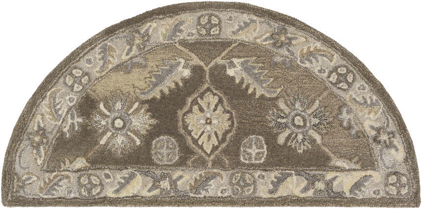 Close-up of the hearth-shaped Solen Area Rug. Hand-tufted 100% wool rug in brown, beige, and taupe with a traditional floral pattern. Design-Hearth