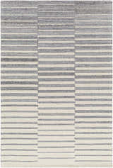 Close-up of the Gawel Gray Area Rug, featuring a contemporary striped pattern in charcoal, light gray, and cream. Hand-tufted wool texture. Design-Rectangle-576