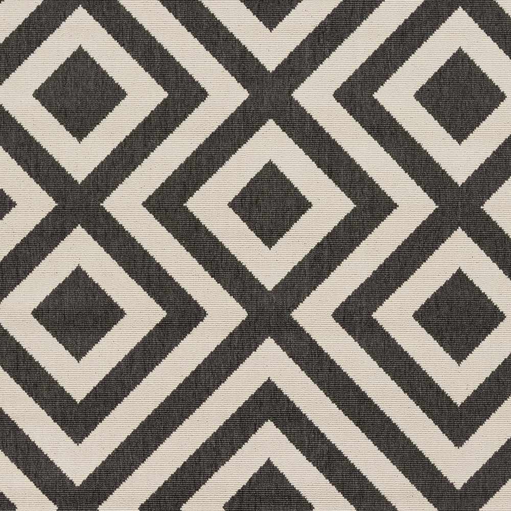 Close-up of Spilsby Geometric Outdoor Rug. Black and light beige diamond pattern. Contemporary style. Swatch