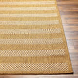 Close-up of the Hiero Flatweave Faux Jute Rug. Beige and champagne stripes on a textured, polypropylene rug. Front