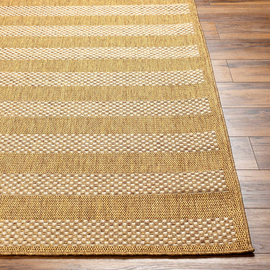 Close-up of the Hiero Flatweave Faux Jute Rug. Beige and champagne stripes on a textured, polypropylene rug. Front