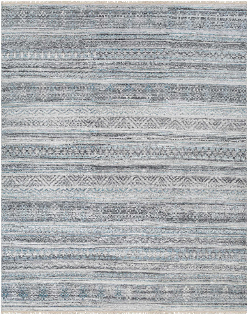 Close-up of the Blue Adda Area Rug. Hand-knotted rug with Scandinavian and Southwestern-inspired blue, gray, and off-white stripes. Design-Rectangle-810