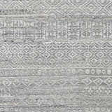 Close-up of Gray Kazi Area Rug. Hand-knotted recycled PET yarn rug with geometric, Scandinavian, Southwestern design. Swatch