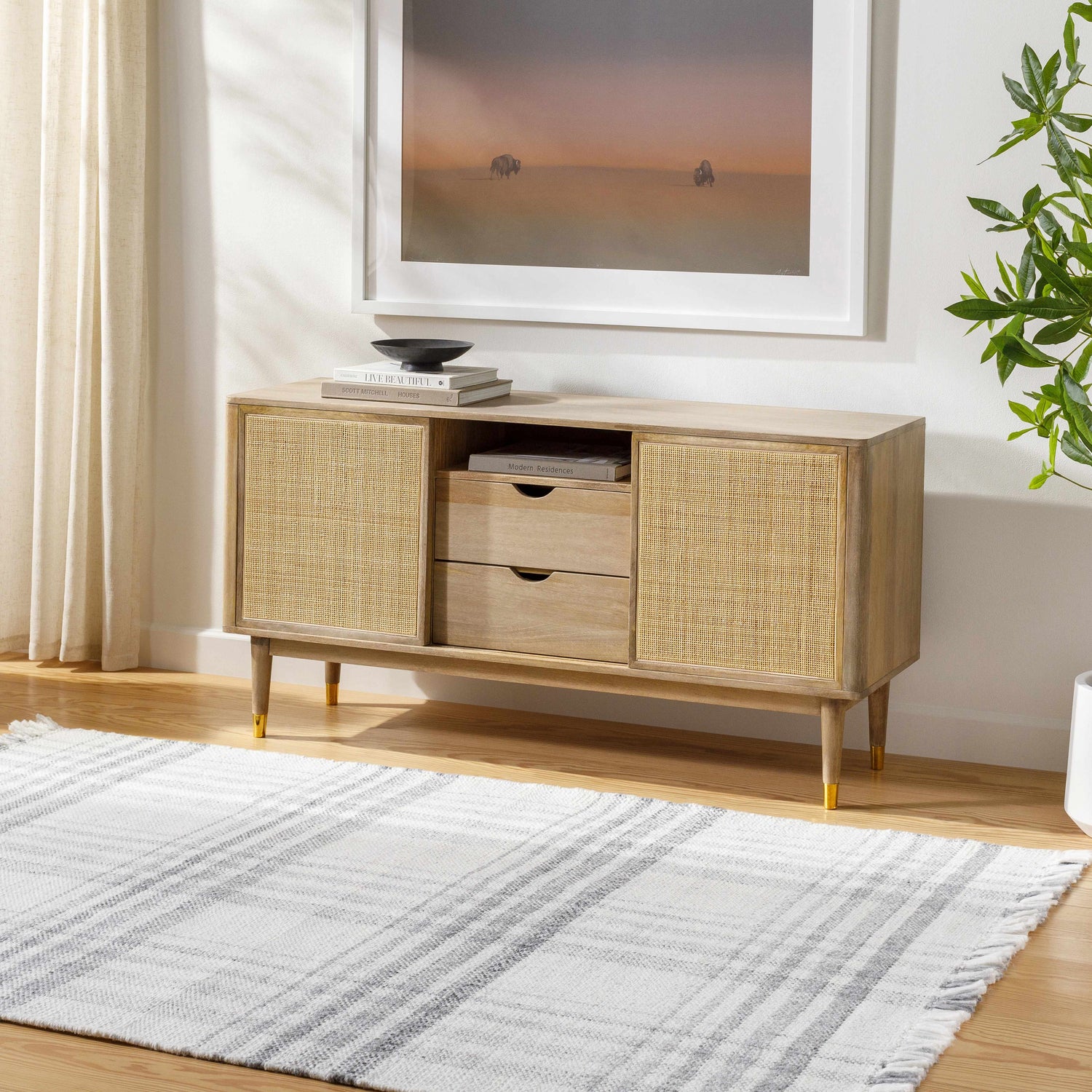 Living room scene with a light wood console table and the Inara Gray Plaid Area Rug, creating a farmhouse style. Roomscene-Rectangle