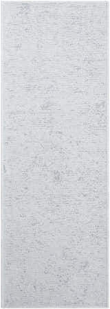 Close-up of the Isako Light Blue Solid Washable Rug showing its subtle texture and light sage color. Design-Runner-2773